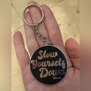 NWT Silver and Black Slow Yourself Down Keychain from Hanalei in Kauai